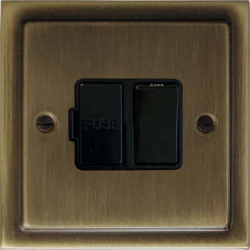 antique brass switched fused spur (black switch) front fc101025