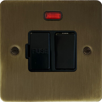 flat antique brass switched fused spur with neon (black switch) front fc101025